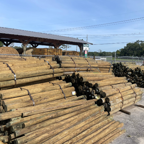 Stacked lumber posts.
