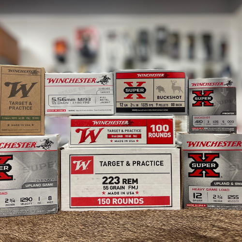 Boxes of Winchester ammunition displayed.