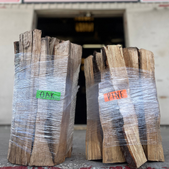 Bundles of pine and oak wood outside of Florida Farm & Ranch.