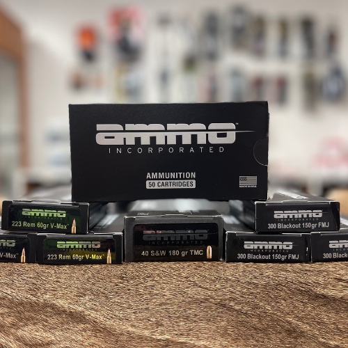 Boxes of Ammo branded ammunition displayed.
