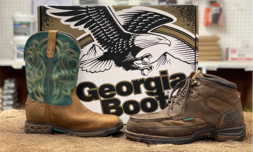 Georgia boots on display in front of a branded shoe box.