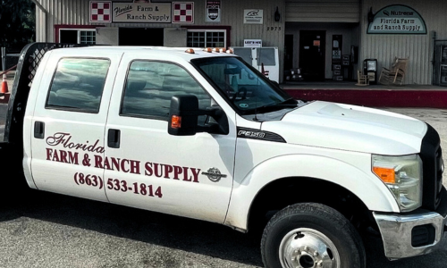 Florida Farm & Ranch Supply store front with a company branded truck parked in the front.